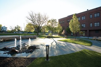 Enjoy Hall-Perrine’s outdoor water feature and gardens.